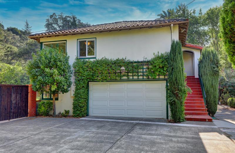 2 Berry Lane garage, shrubbery, red staircase