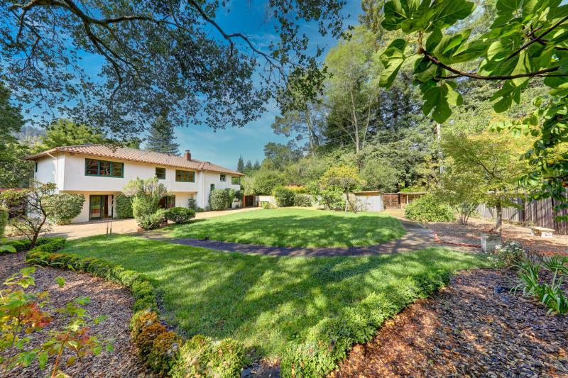 2 Berry Lane yard and spanish stucco home