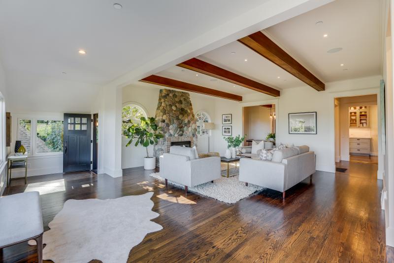 wood floors beamed ceiling. 