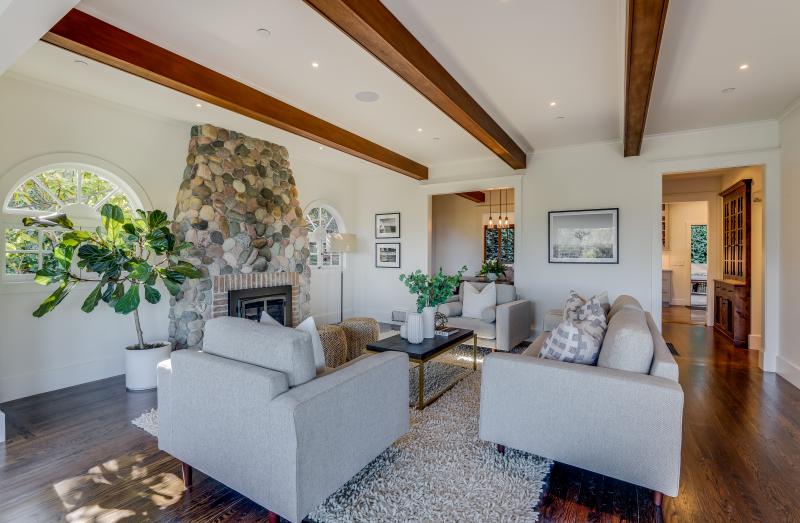 living room with stone hearth