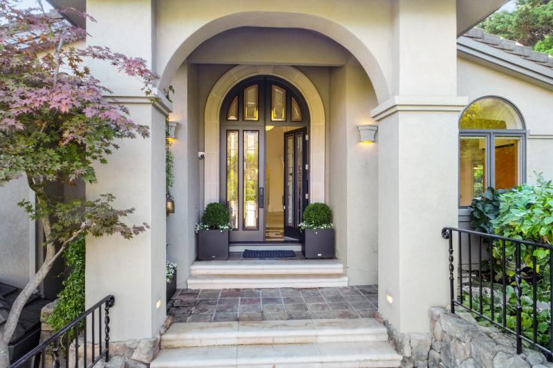 arched stucco entry
