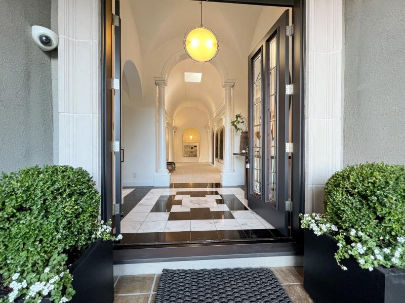 foyer with tile and arches