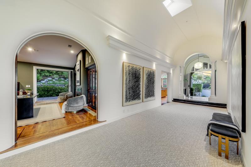 looking down a carpeted hall