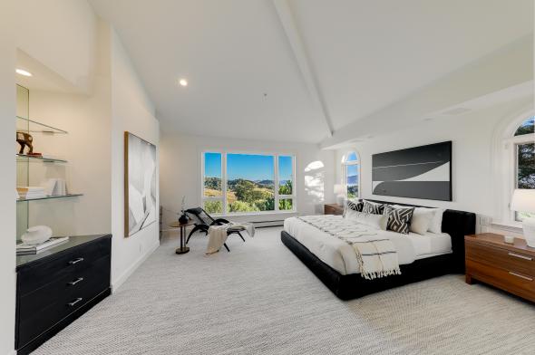 giant bed with white and black decor