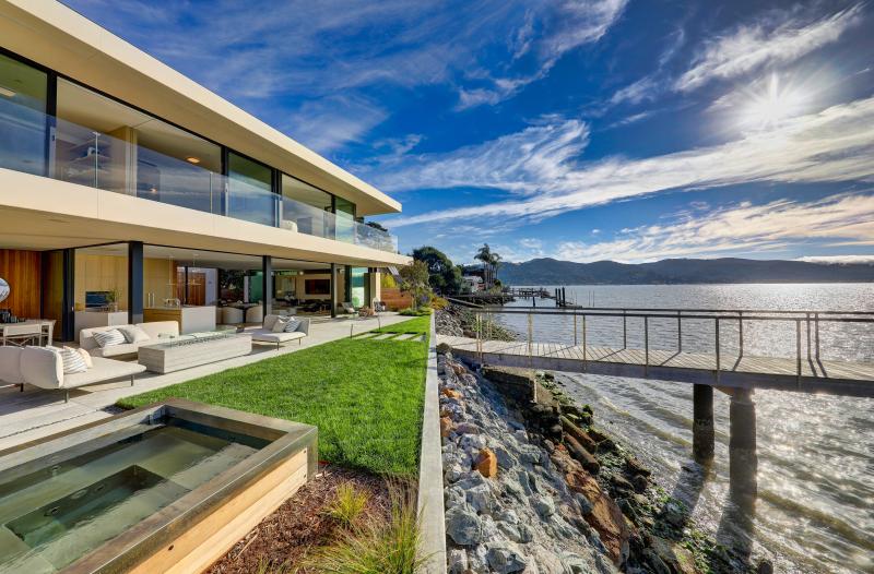 waterfront home, blue sky