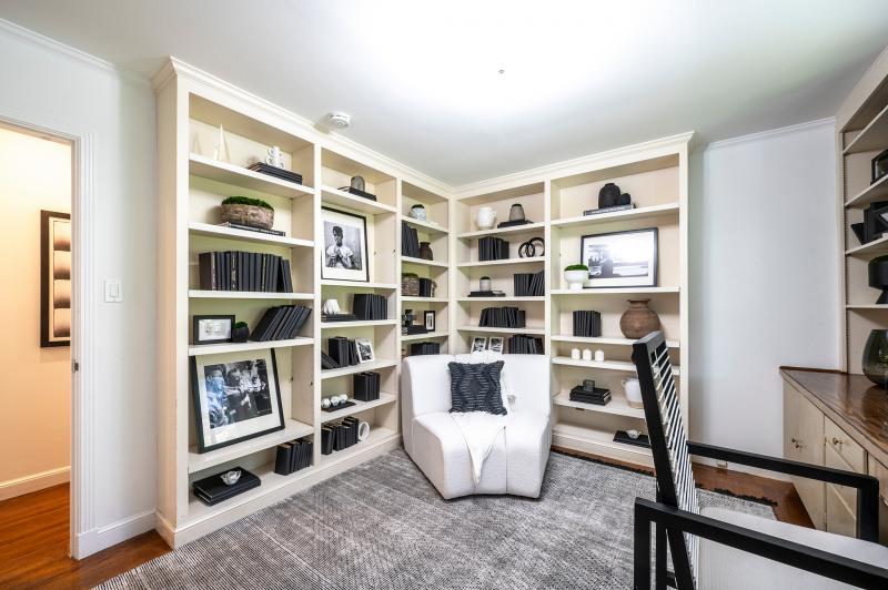 bookshelves and corner chair